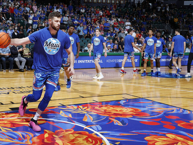 HONOLULU, HI - NOVEMBER 20: Kansas Jayhawks center Hunter Dickinson (1) wears Maui Strong warm up jersey in support of the residents of Lahaina, Maui, who survived the fires as seen during the game against the Chaminade Silverswords during the first round of the Allstate Maui Invitational on November 20, 2023, at the Stan Sheriff Center in Honolulu, Hawaii.