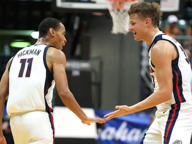 HONOLULU, HI - NOVEMBER 21: Nolan Hickman #11 of the Gonzaga Bulldogs and Ben Gregg #33 of the Gonzaga Bulldogs celebrate a shot in the second half during a college basketball game on day two of the Allstate Maui Invitational at the SimpliFi Arena at Stan Sheriff Center on November 21, 2023 in Honolulu, Hawaii.