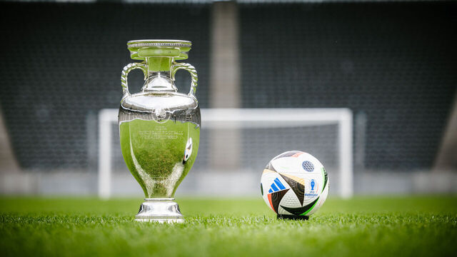 BERLIN, GERMANY - OCTOBER 10: The official match ball "Fussballliebe" and the EURO trophy are presented in the Olympic Stadium on October 10, 2023 in Berlin, Germany.