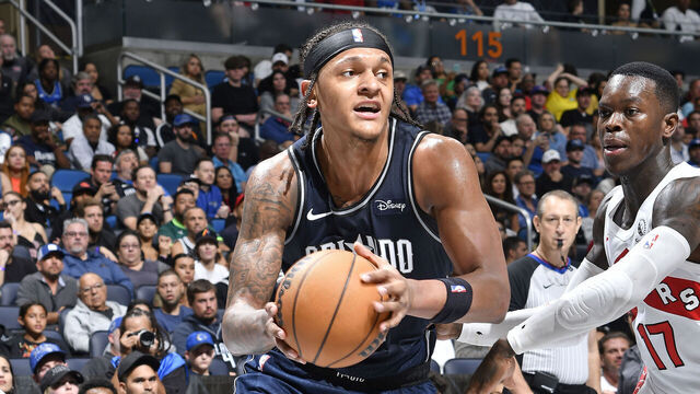 ORLANDO, FL - NOVEMBER 21: Paolo Banchero #5 of the Orlando Magic dribbles the ball during the game against the Toronto Raptors during the In-Season Tournament on November 21, 2023 at Amway Center in Orlando, Florida. Mandatory Copyright Notice: Copyright 2023 NBAE