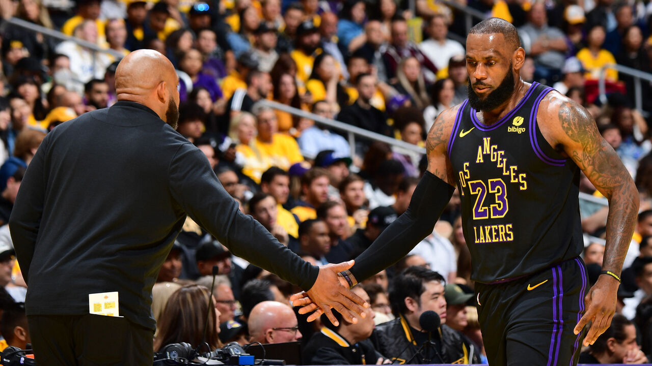 LOS ANGELES, CA - NOVEMBER 21: Head Coach Darvin Ham of the Los Angeles Lakers & LeBron James #23 of the Los Angeles Lakers high five during the game during the in Season Tournament on November 21, 2023 at Crypto.Com Arena in Los Angeles, California. NOTE TO USER: User expressly acknowledges and agrees that, by downloading and/or using this Photograph, user is consenting to the terms and conditions of the Getty Images License Agreement. Mandatory Copyright Notice: Copyright 2023 NBAE