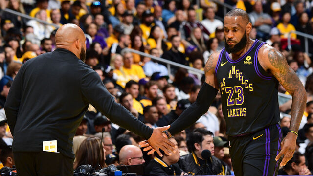 LOS ANGELES, CA - NOVEMBER 21: Head Coach Darvin Ham of the Los Angeles Lakers & LeBron James #23 of the Los Angeles Lakers high five during the game during the in Season Tournament on November 21, 2023 at Crypto.Com Arena in Los Angeles, California. NOTE TO USER: User expressly acknowledges and agrees that, by downloading and/or using this Photograph, user is consenting to the terms and conditions of the Getty Images License Agreement. Mandatory Copyright Notice: Copyright 2023 NBAE