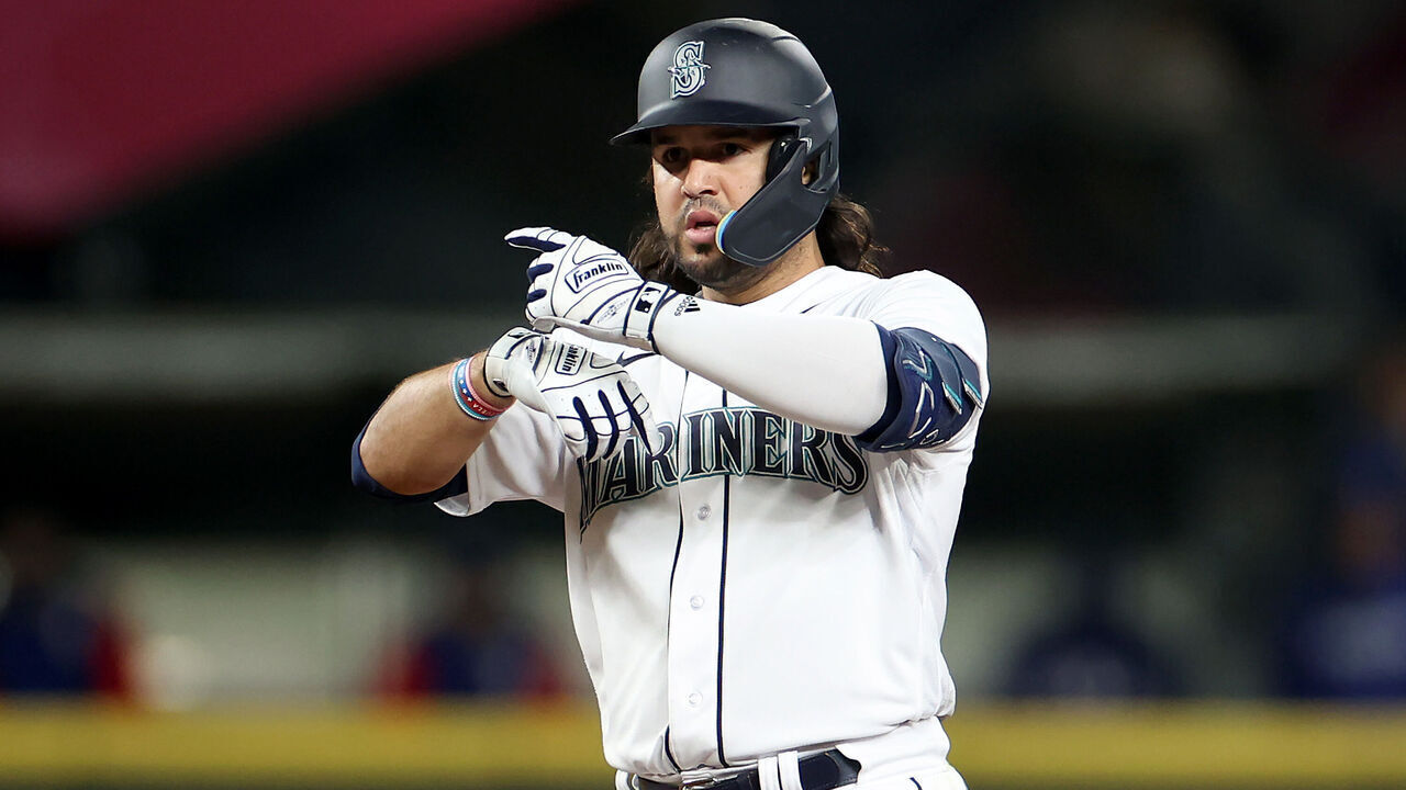 SEATTLE, WASHINGTON - SEPTEMBER 28: Eugenio Suarez #28 of the Seattle Mariners reacts after his double during the sixth inning against the Texas Rangers at T-Mobile Park on September 28, 2023 in Seattle, Washington.