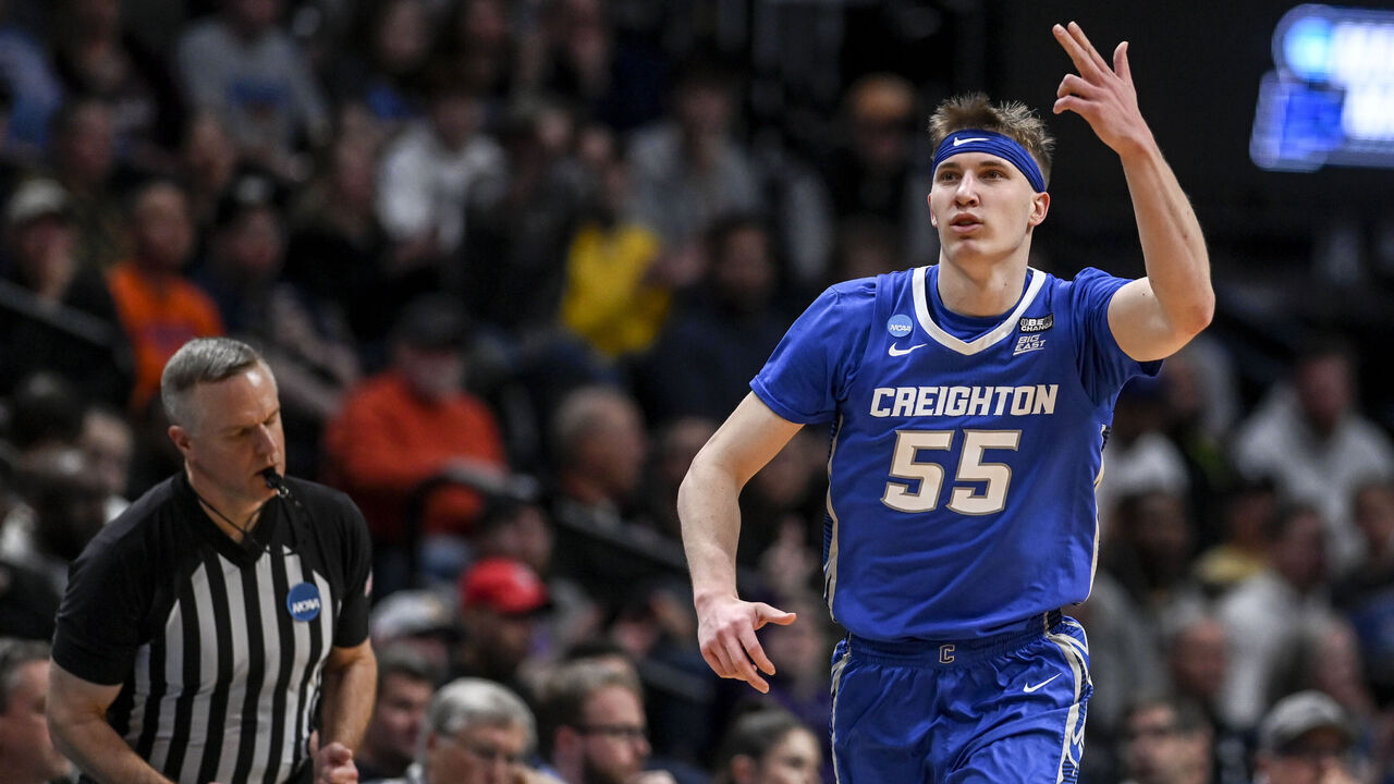 DENVER, CO - MARCH 19: Baylor Scheierman (55) of the Creighton Bluejays celebrates a three against the Baylor Bears during the first half of their second round NCAA mens basketball tournament game at Ball Arena in Denver on Sunday, March 19, 2023.