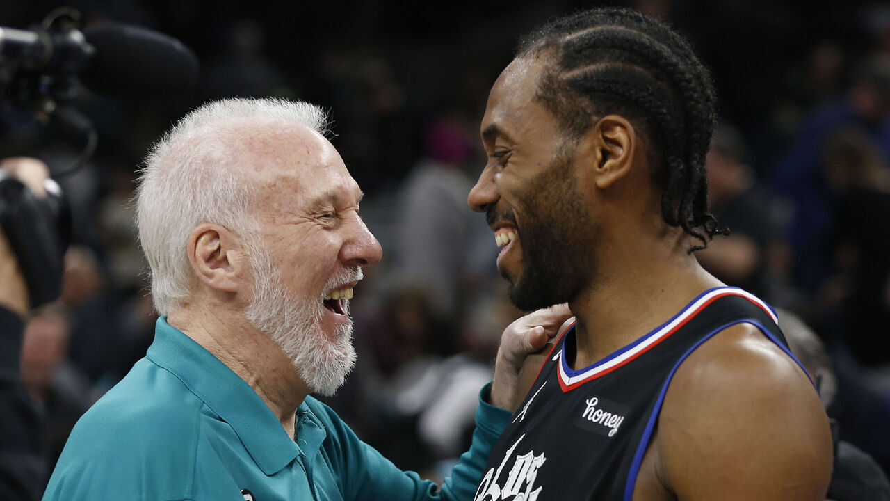 SAN ANTONIO, TX - JANUARY 20: Head coach Gregg Popovich of the San Antonio Spurs greets Kawhi Leonard #2 of the Los Angeles Clippers at the end of the game at AT&T Center on January 20, 2023 in San Antonio, Texas. NOTE TO USER: User expressly acknowledges and agrees that, by downloading and or using this photograph, User is consenting to terms and conditions of the Getty Images License Agreement.