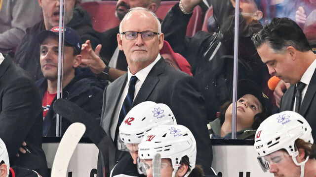 MONTREAL, CANADA - OCTOBER 24: Head coach of the New Jersey Devils Lindy Ruff, handles bench duties during the first period against the Montreal Canadiens at the Bell Centre on October 24, 2023 in Montreal, Quebec, Canada. The New Jersey Devils defeated the Montreal Canadiens 5-2.