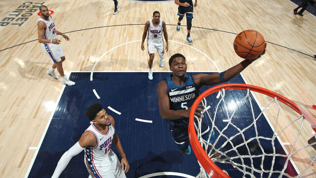 MINNEAPOLIS, MN - NOVEMBER 22: Anthony Edwards #5 of the Minnesota Timberwolves drives to the basket during the game against the Philadelphia 76ers on November 22, 2023 at Target Center in Minneapolis, Minnesota. Mandatory Copyright Notice: Copyright 2023 NBAE