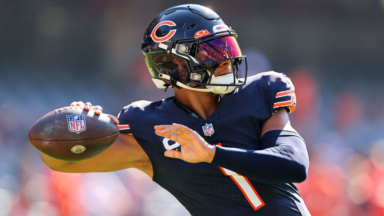 CHICAGO, ILLINOIS - OCTOBER 01: Justin Fields #1 of the Chicago Bears warms up before the game against the Denver Broncos at Soldier Field on October 01, 2023 in Chicago, Illinois.