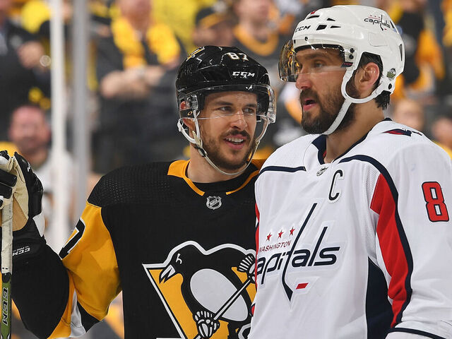 PITTSBURGH, PA - MAY 01: Sidney Crosby #87 of the Pittsburgh Penguins looks on alongside Alex Ovechkin #8 of the Washington Capitals in Game Three of the Eastern Conference Second Round during the 2018 NHL Stanley Cup Playoffs at PPG Paints Arena on May 1, 2018 in Pittsburgh, Pennsylvania. *** Local Caption ***