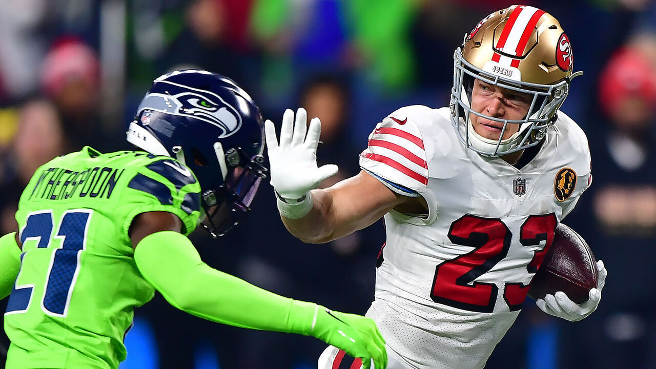 SEATTLE, WASHINGTON - NOVEMBER 23: Christian McCaffrey #23 of the San Francisco 49ers runs with the ball during the first quarter against the Seattle Seahawks at Lumen Field on November 23, 2023 in Seattle, Washington.