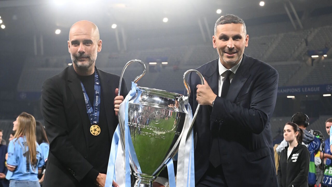 ISTANBUL, TURKEY - JUNE 10: Sheikh Mansour, the owner of Manchester City FC and Josep Guardiola, the managger of Manchester City FC hold the Champions League Cup during the UEFA Champions League 2022/23 final match between FC Internazionale and Manchester City FC at Ataturk Olympic Stadium on June 10, 2023 in Istanbul, Turkey.