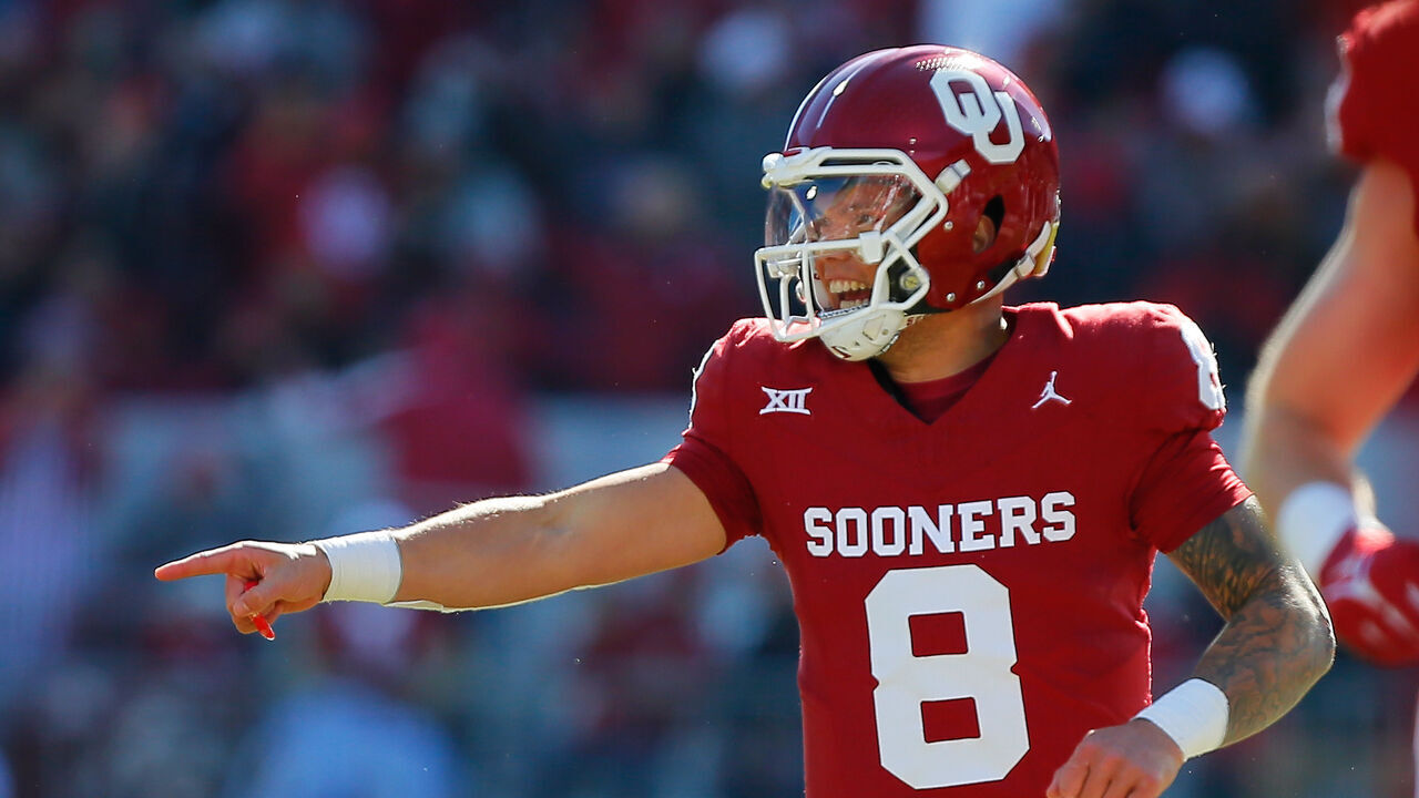 NORMAN, OKLAHOMA - NOVEMBER 24: Quarterback Dillon Gabriel #8 of the Oklahoma Sooners celebrates after throwing a 53-yard touchdown to wide receiver Brenen Thompson against the TCU Horned Frogs in the second quarter at Gaylord Family Oklahoma Memorial Stadium on November 24, 2023 in Norman, Oklahoma.