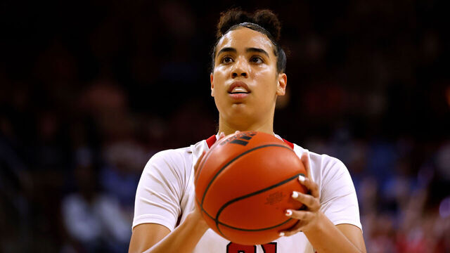 RALEIGH, NC - FEBRUARY 16: Madison Hayes #21 of the NC State Wolfpack prepares to shoot a free throw against the North Carolina Tar Heels at Reynolds Coliseum on February 16, 2023 in Raleigh, North Carolina. NC State won 77-66 in OT.