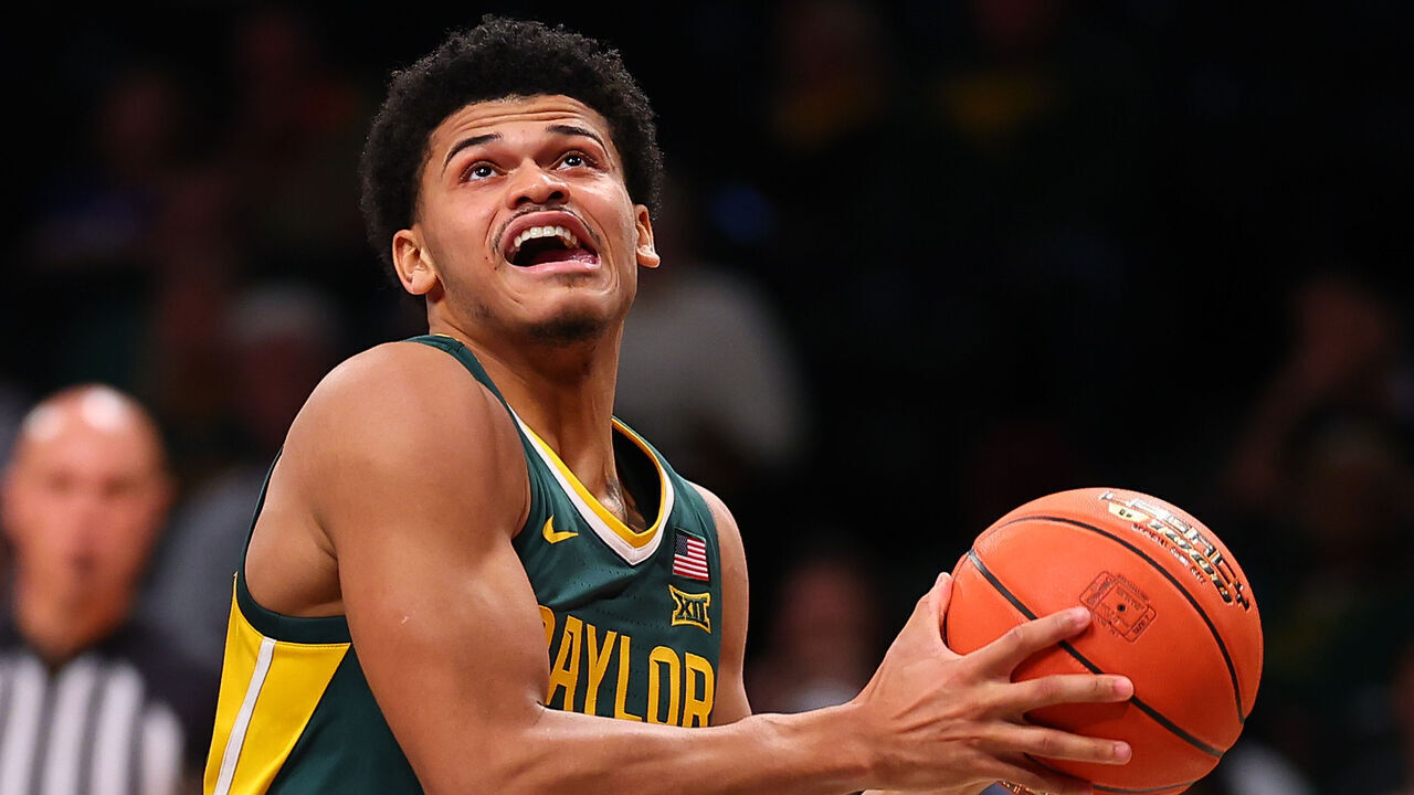 BROOKLYN, NY - NOVEMBER 22: RayJ Dennis #10 of the Baylor Bears during the NIT Season Tip-Off college basketball game against the Oregon State Beavers on November 22, 2023 at the Barclays Center in Brooklyn, New York.