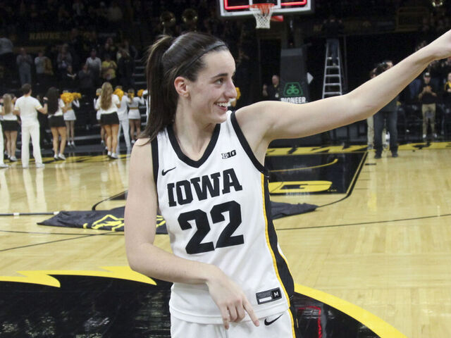 IOWA CITY, IOWA- NOVEMBER 19: Guard Caitlin Clark #22 of the Iowa Hawkeyes gestures to the crowd after the match-up against the Drake Bulldogs at Carver-Hawkeye Arena on November 19, 2023 in Iowa City, Iowa.