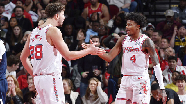 HOUSTON, TX - NOVEMBER 24: Alperen Sengun #28 high fives Jalen Green #4 of the Houston Rockets during the game against the Denver Nuggets during the In-Season Tournament on November 24, 2023 at the Toyota Center in Houston, Texas. Mandatory Copyright Notice: Copyright 2023 NBAE