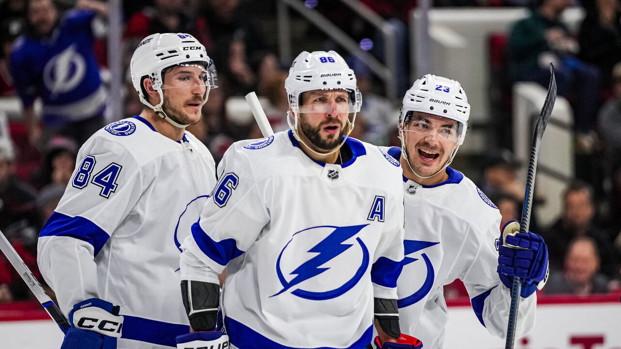 RALEIGH, NORTH CAROLINA - NOVEMBER 24: Nikita Kucherov #86 of the Tampa Bay Lightning celebrates with teammates after a goal during the second period against the Carolina Hurricanes at PNC Arena on November 24, 2023 in Raleigh, North Carolina.