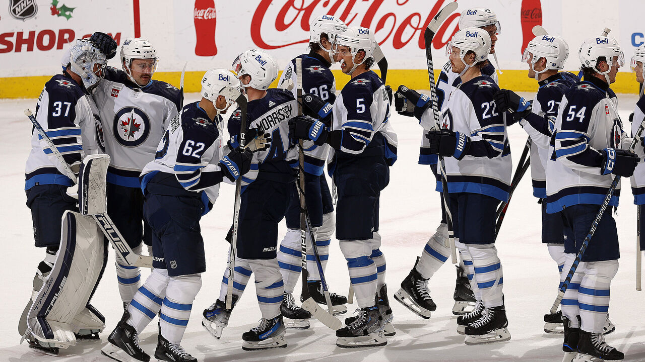 SUNRISE, FLORIDA - NOVEMBER 24: The Winnipeg Jets celebrate their 3-0 shut out win over the Florida Panthers at the Amerant Bank Arena on November 24, 2023 in Sunrise, Florida.