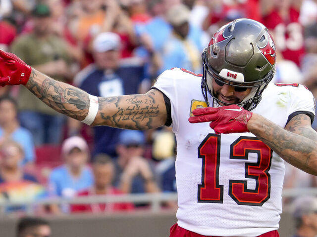 TAMPA, FL - NOVEMBER 12 : Tampa Bay Buccaneers wide receiver Mike Evans (13) catches the ball for a first and goal during the NFL Football match between the Tampa Bay Bucs and Tennessee Titans on November 12th 2023 at Raymond James Stadium, Tampa FL.
