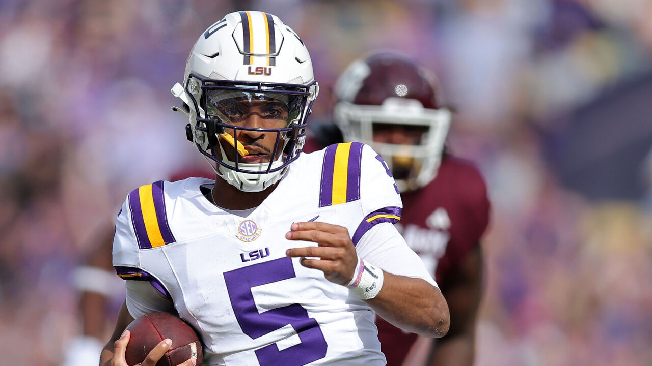 BATON ROUGE, LOUISIANA - NOVEMBER 25: Jayden Daniels #5 of the LSU Tigers runs with the ball during the first half against the Texas A&M Aggies at Tiger Stadium on November 25, 2023 in Baton Rouge, Louisiana.