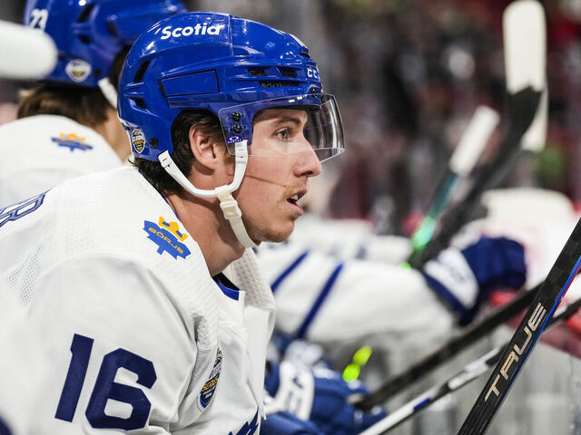 STOCKHOLM, SWEDEN - NOVEMBER 19: Mitch Marner #16 of the Toronto Maple Leafs looks on from the bench against the Minnesota Wild in the first period during the 2023 NHL Global Series Sweden at Avicii Arena on November 19, 2023 in Stockholm, Sweden.