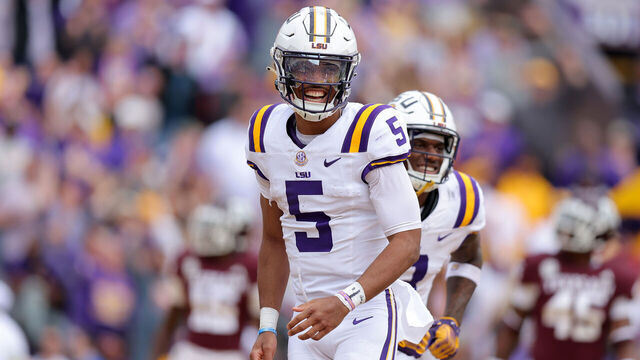 BATON ROUGE, LOUISIANA - NOVEMBER 25: Jayden Daniels #5 of the LSU Tigers celebrates a touchdown during the second half against the Texas A&M Aggies at Tiger Stadium on November 25, 2023 in Baton Rouge, Louisiana.