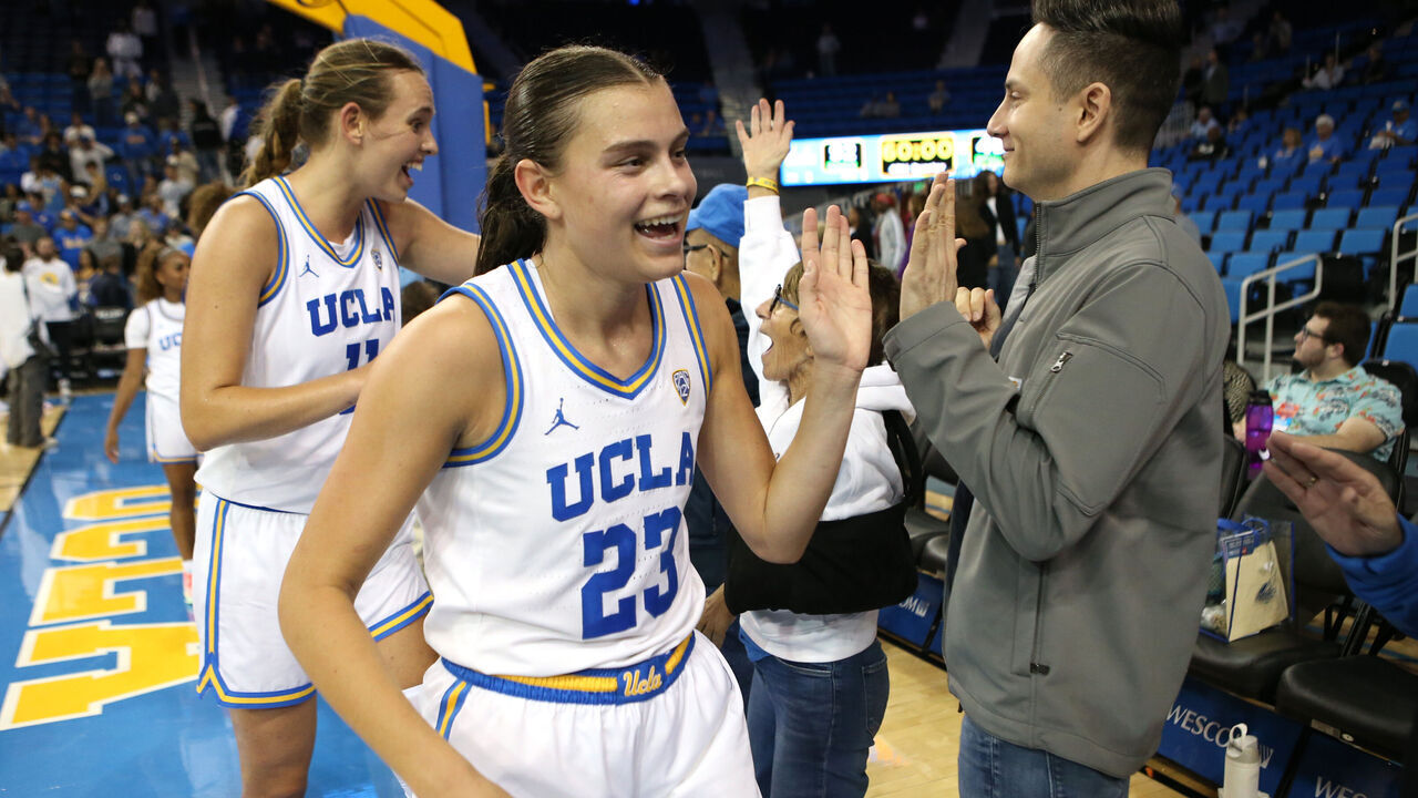 LOS ANGELES, CALIFORNIA - NOVEMBER 06: Gabriela Jaquez #23 of the UCLA Bruins high-fives fans following a game against the Purdue Boilermakers at UCLA Pauley Pavilion on November 06, 2023 in Los Angeles, California.