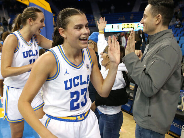 LOS ANGELES, CALIFORNIA - NOVEMBER 06: Gabriela Jaquez #23 of the UCLA Bruins high-fives fans following a game against the Purdue Boilermakers at UCLA Pauley Pavilion on November 06, 2023 in Los Angeles, California.