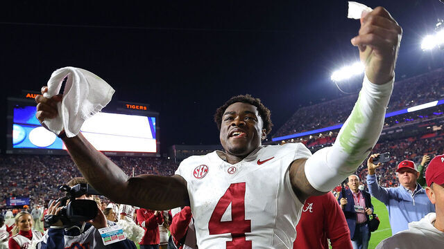 AUBURN, ALABAMA - NOVEMBER 25: Jalen Milroe #4 of the Alabama Crimson Tide celebrates their 27-24 win over the Auburn Tigers at Jordan-Hare Stadium on November 25, 2023 in Auburn, Alabama.