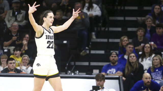 IOWA CITY, IOWA- NOVEMBER 19: Guard Caitlin Clark #22 of the Iowa Hawkeyes gestures to the crowd after a basket during the second half against the Drake Bulldogs at Carver-Hawkeye Arena on November 19, 2023 in Iowa City, Iowa.