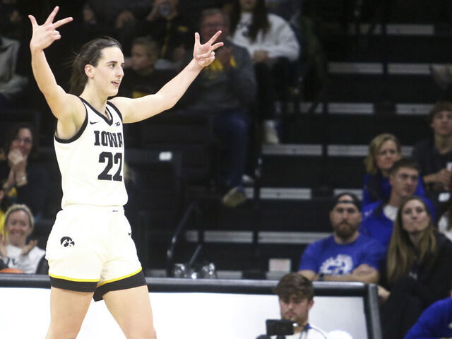 IOWA CITY, IOWA- NOVEMBER 19: Guard Caitlin Clark #22 of the Iowa Hawkeyes gestures to the crowd after a basket during the second half against the Drake Bulldogs at Carver-Hawkeye Arena on November 19, 2023 in Iowa City, Iowa.