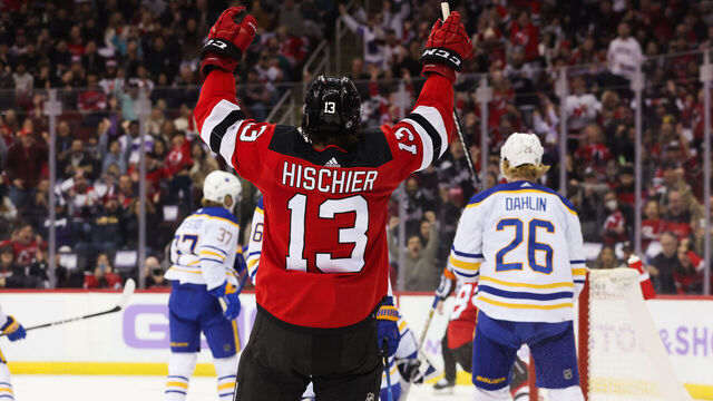 NEWARK, NJ - NOVEMBER 25: New Jersey Devils center Nico Hischier (13) celebrates after New Jersey Devils left wing Ondrej Palat (18) (not pictured) scores a goal during a game between the Buffalo Sabres and New Jersey Devils on November 25, 2023 at Prudential Center in the Newark, New Jersey.