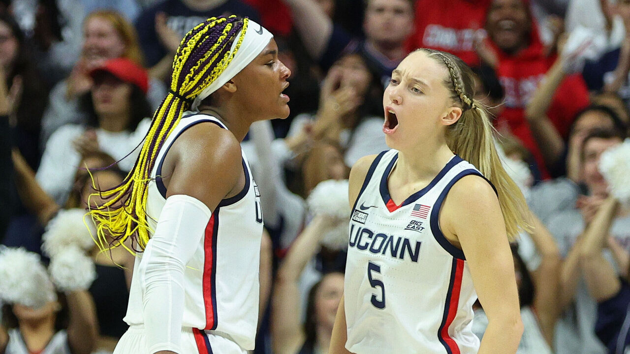 STORRS, CT - NOVEMBER 16: UConn Huskies guard Paige Bueckers (5) and UConn Huskies forward Aaliyah Edwards (3) react after a made basket during a college basketball game between Maryland Terrapins and UConn Huskies on November 16, 2023, at Harry A. Gampel Pavilion in Storrs, CT.