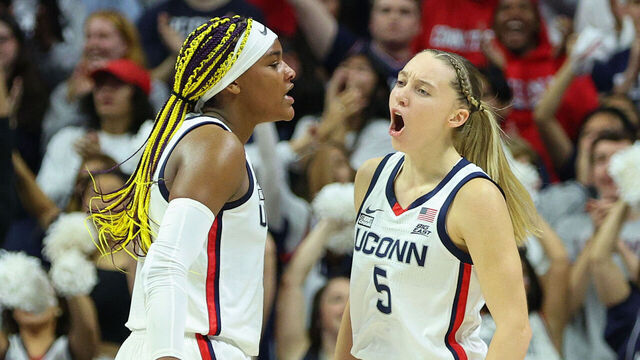 STORRS, CT - NOVEMBER 16: UConn Huskies guard Paige Bueckers (5) and UConn Huskies forward Aaliyah Edwards (3) react after a made basket during a college basketball game between Maryland Terrapins and UConn Huskies on November 16, 2023, at Harry A. Gampel Pavilion in Storrs, CT.