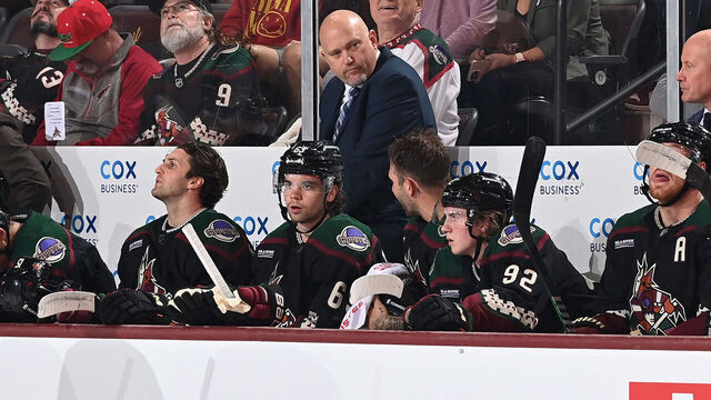 TEMPE, ARIZONA - OCTOBER 21: Head coach Andre Tourigny of the Arizona Coyotes looks up ice against the Anaheim Ducks at Mullett Arena on October 21, 2023 in Tempe, Arizona.