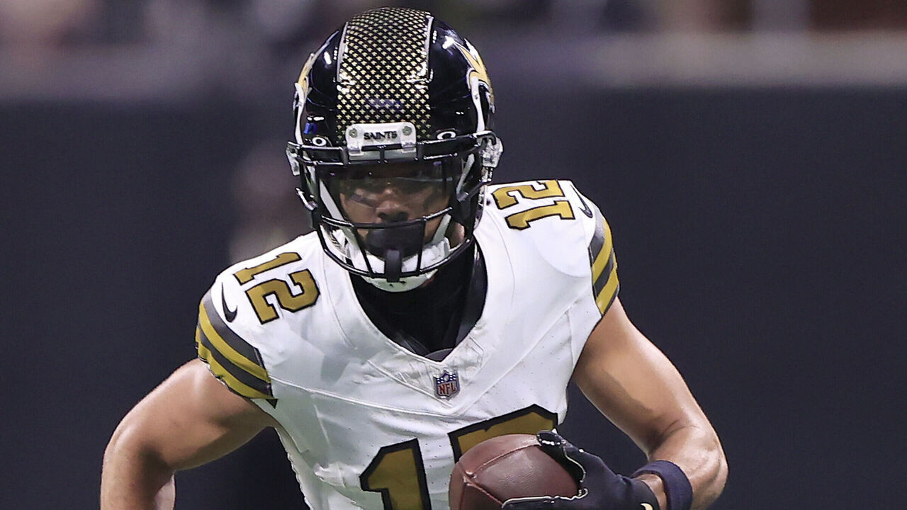 ATLANTA, GA - NOVEMBER 26: New Orleans Saints wide receiver Chris Olave (12) runs during the Week 12 NFL game between the Atlanta Falcons and the New Orleans Saints on November 26, 2023 at the Mercedes-Benz Stadium in Atlanta, Georgia.