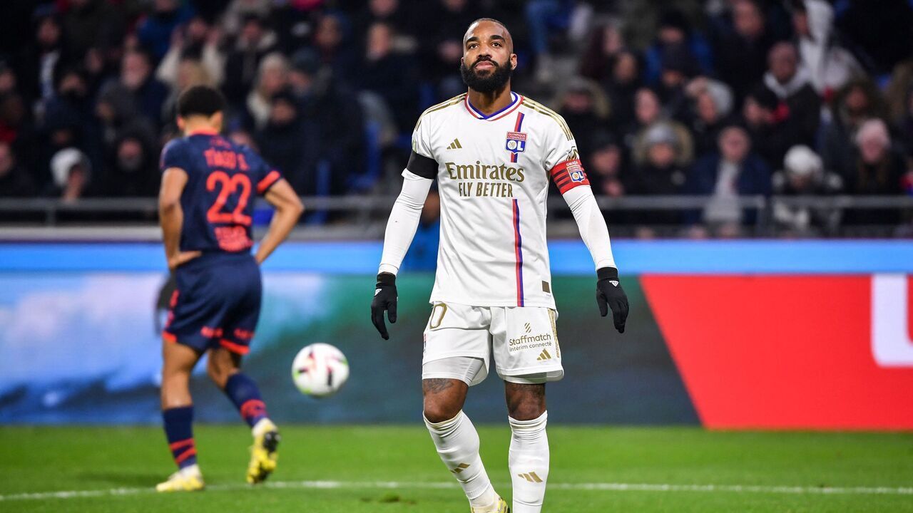 Lyon's French forward #10 Alexandre Lacazette reacts after missing a goal opportunity during the French L1 football match between Olympique Lyonnais (Lyon) and LOSC (Lille) at the Groupama stadium in Lyon, central eastern France on November 26, 2023.