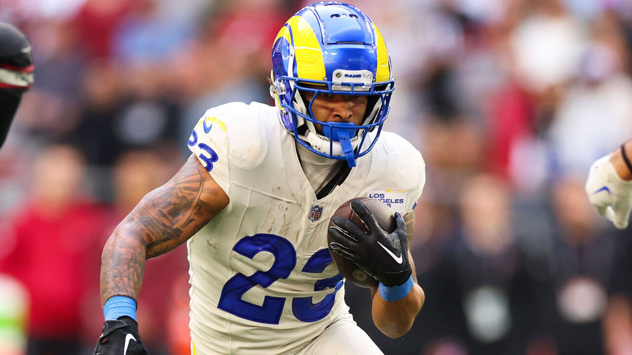 GLENDALE, ARIZONA - NOVEMBER 26: Kyren Williams #23 of the Los Angeles Rams runs the ball during the first quarter against the Arizona Cardinals at State Farm Stadium on November 26, 2023 in Glendale, Arizona.
