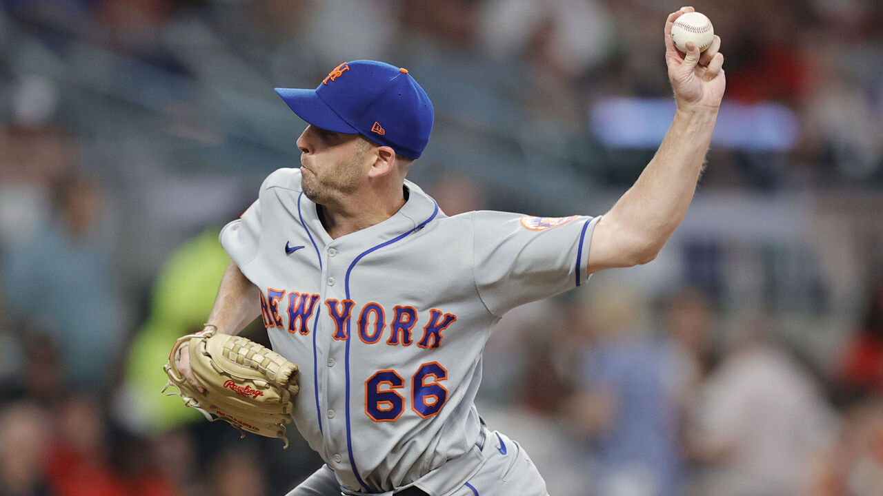 ATLANTA, GEORGIA - AUGUST 22: Adam Kolarek #66 of the New York Mets pitches during the seventh inning against the Atlanta Braves at Truist Park on August 22, 2023 in Atlanta, Georgia.