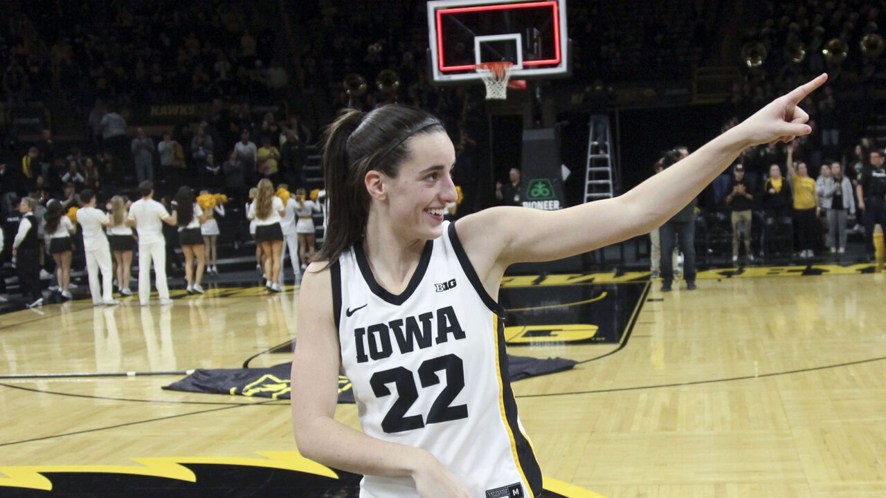 IOWA CITY, IOWA- NOVEMBER 19: Guard Caitlin Clark #22 of the Iowa Hawkeyes gestures to the crowd after the match-up against the Drake Bulldogs at Carver-Hawkeye Arena on November 19, 2023 in Iowa City, Iowa.