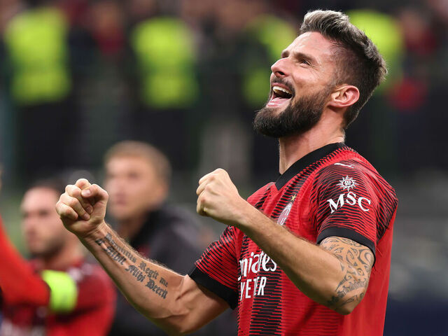 MILAN, ITALY - 2023/11/08: Olivier Giroud (AC Milan) celebrates the victory and greets the fans in the stands at the end of the soccer game AC Milan vs PSG - Champions League 2023/2024 Group F match day 4 at San Siro Stadium. AC Milan wins 2-1.