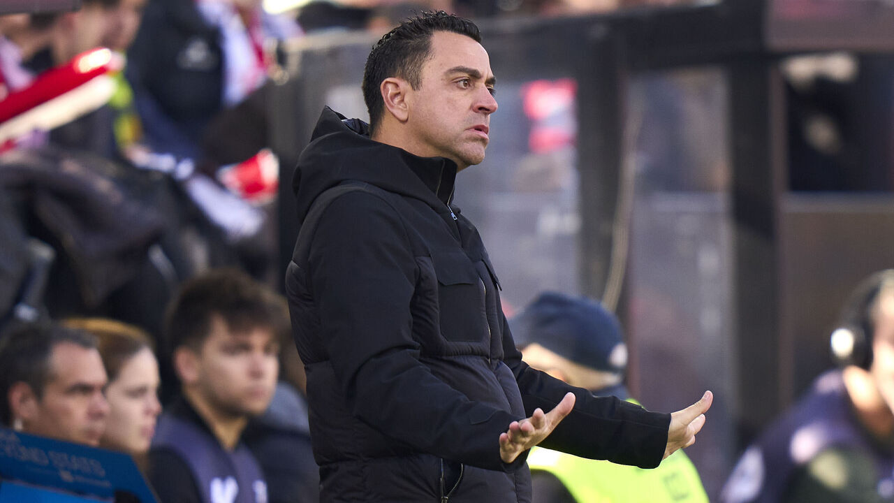 MADRID, SPAIN - NOVEMBER 25: Xavi Hernandez head coach of FC Barcelona reacts during the LaLiga EA Sports match between Rayo Vallecano and FC Barcelona at Estadio de Vallecas on November 25, 2023 in Madrid, Spain.