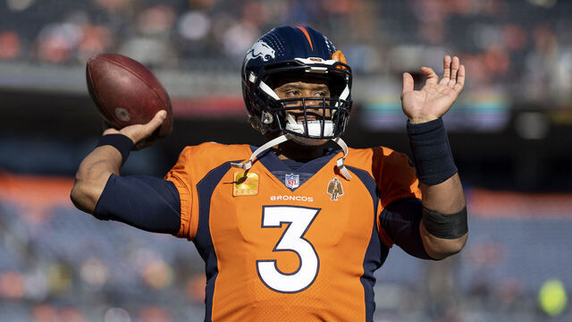 DENVER, COLORADO - NOVEMBER 26: Russell Wilson #3 of the Denver Broncos throws a pass as he warms up prior to an NFL football game between the Denver Broncos and the Cleveland Browns at Empower Field At Mile High on November 26, 2023 in Denver, Colorado.