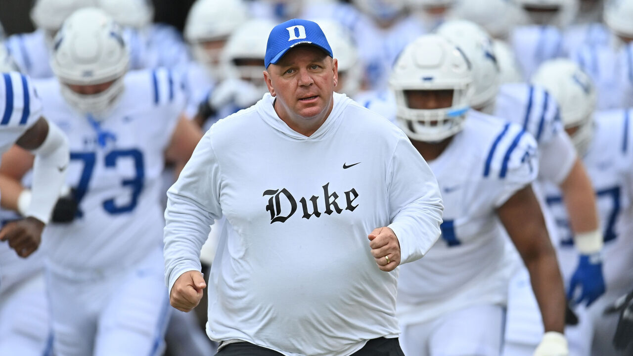 EAST HARTFORD, CT - SEPTEMBER 23: Duke Blue Devils head coach Mike Elko leads the team out onto the field during the game as the Duke Blue Devils take on the UConn Huskies on September 23, 2023, at the Rentschler Field in East Hartford, Connecticut.