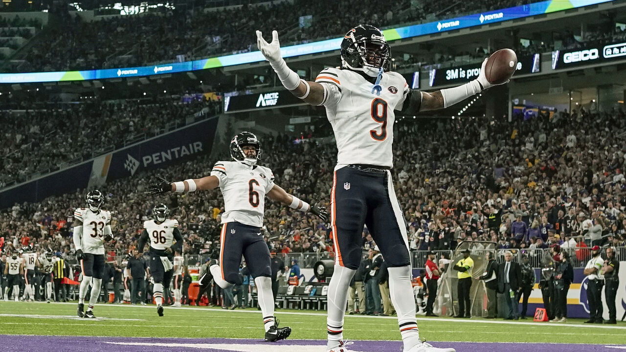 MINNEAPOLIS, MN - NOVEMBER 27: Chicago Bears defensive back Jaquan Brisker (9) does the Skol Chant after intercepting Minnesota Vikings quarterback Joshua Dobbs (15) during the second quarter of an NFL game between the Minnesota Vikings and Chicago Bears on November 27, 2023, at U.S. Bank Stadium in Minneapolis, MN.