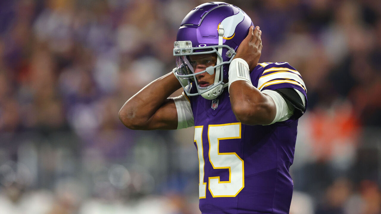 MINNEAPOLIS, MINNESOTA - NOVEMBER 27: Joshua Dobbs #15 of the Minnesota Vikings listens for a play call during the second quarter against the Chicago Bears at U.S. Bank Stadium on November 27, 2023 in Minneapolis, Minnesota.