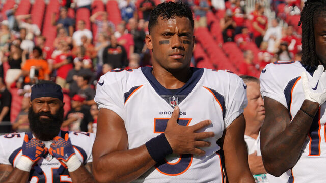 SANTA CLARA, CALIFORNIA - AUGUST 19: Russell Wilson #3 and Jerry Jeudy #10 of the Denver Broncos stand with teammates for the national anthem before a preseason game against the San Francisco 49ers at Levi's Stadium on August 19, 2023 in Santa Clara, California.