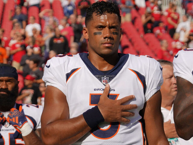 SANTA CLARA, CALIFORNIA - AUGUST 19: Russell Wilson #3 and Jerry Jeudy #10 of the Denver Broncos stand with teammates for the national anthem before a preseason game against the San Francisco 49ers at Levi's Stadium on August 19, 2023 in Santa Clara, California.