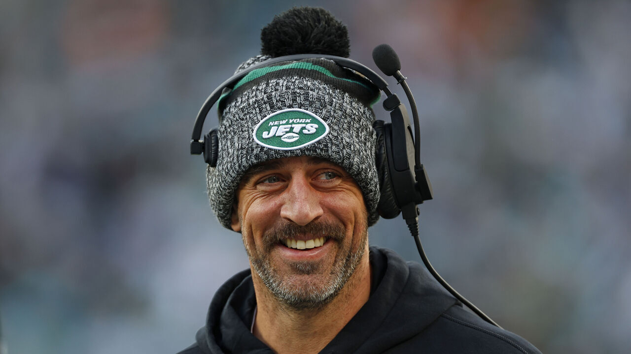 EAST RUTHERFORD, NEW JERSEY - NOVEMBER 24: Quarterback Aaron Rodgers #8 of the New York Jets on the sidelines during a football game against the Miami Dolphins at MetLife Stadium on November 24, 2023 in East Rutherford, New Jersey.