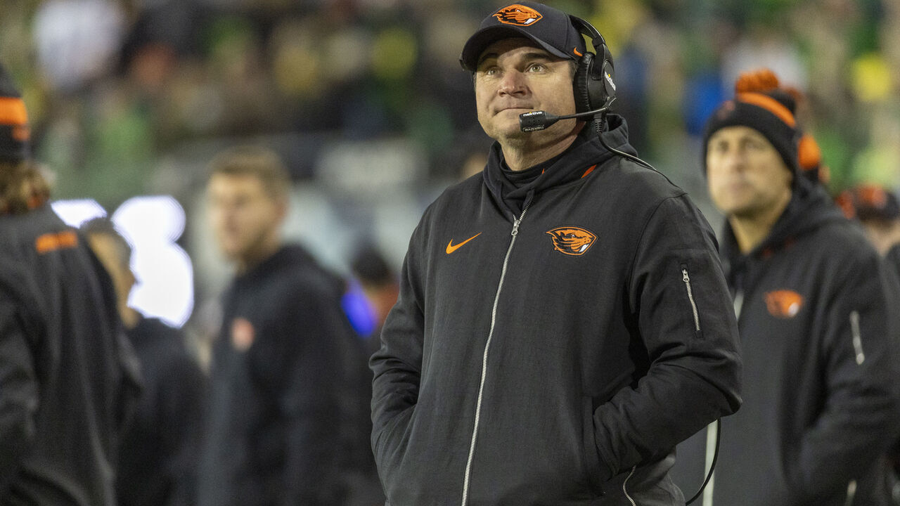EUGENE, OREGON - NOVEMBER 24: Head coach Jonathan Smith of the Oregon State Beavers stands on the field during the first half against the Oregon Ducksat Autzen Stadium on November 24, 2023 in Eugene, Oregon.